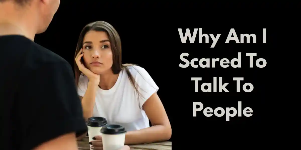 Person feeling anxious in conversation, showing why am i scared to talk to people